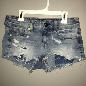 Distressed jean shorts